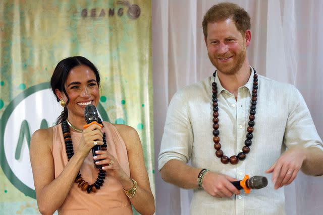 <p>AFOLABI SOTUNDE/EPA-EFE/Shutterstock</p> Meghan Markle and Prince Harry at Lightway Academy in Abuja, Nigeria on May 10, 2024.