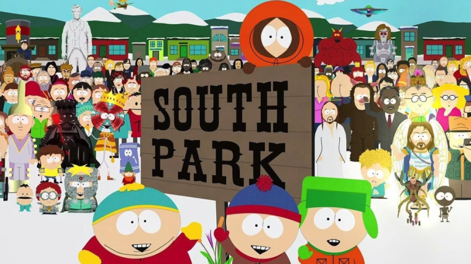 South Park characters assembled around a wooden South Park sign