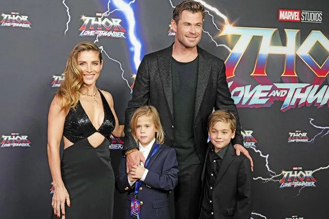 Mark Baker/AP/Shutterstock Chris Hemsworth and his wife Elsa Pataky with their twin boys Tristan and Sasha in 2022