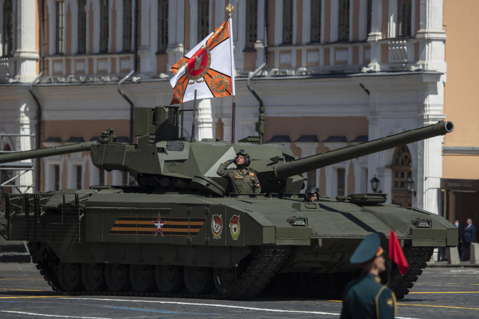 Russian army's Armata tank rolls through Red Square during the Victory Day military parade marking the 75th anniversary of the Nazi defeat in WWII, in Moscow, Russia, Wednesday, June 24, 2020. The Victory Day parade normally is held on May 9, the nation's most important secular holiday, but this year it was postponed due to the coronavirus pandemic. (AP Photo/Pavel Golovkin, Pool)