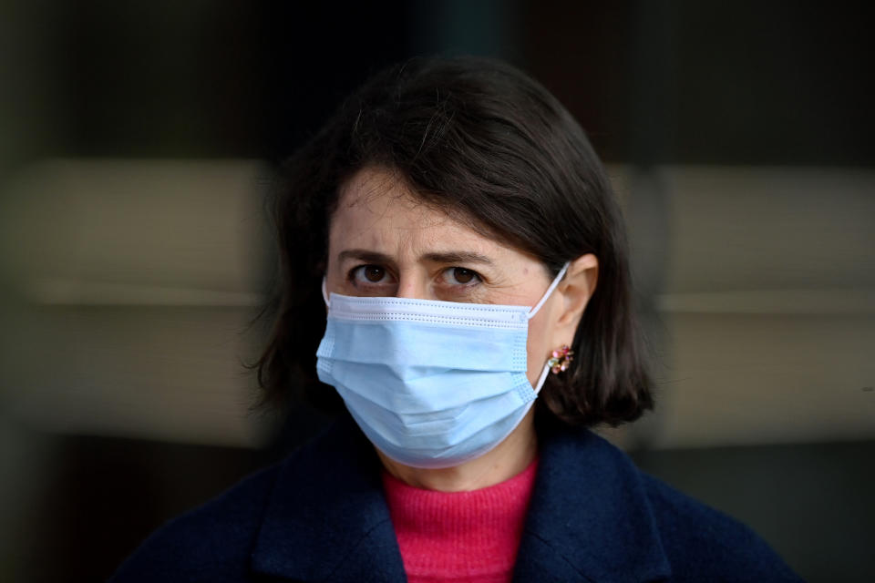 NSW Premier Gladys Berejiklian wears a face mask.