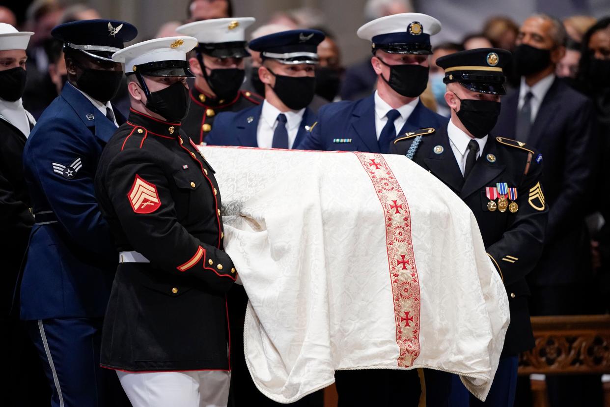 A military bearer team moves the casket during the funeral for former Secretary of State Colin Powell at the Washington National Cathedral, in Washington, Friday, Nov. 5. 