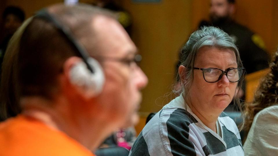 PHOTO: Jennifer Crumbley looks at her husband James Crumbley during their sentencing, Apr. 9, 2024, at Oakland County Circuit Court in Pontiac, Michigan.  (Bill Pugliano/Getty Images)