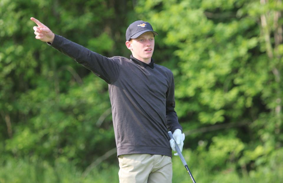 Northville's Mason Sokolowski points in the direction his tee shot carried on No. 1 during the state Division 1 golf tournament Saturday, June 10, 2023 at The Meadows in Allendale.