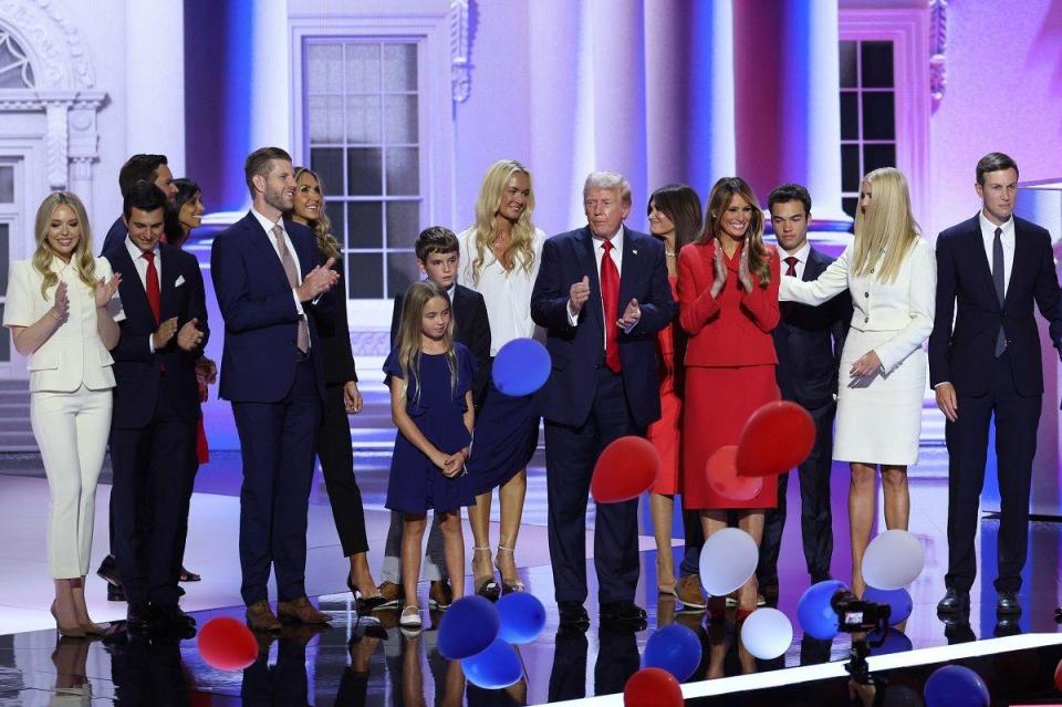 a line of Trump family members on stage