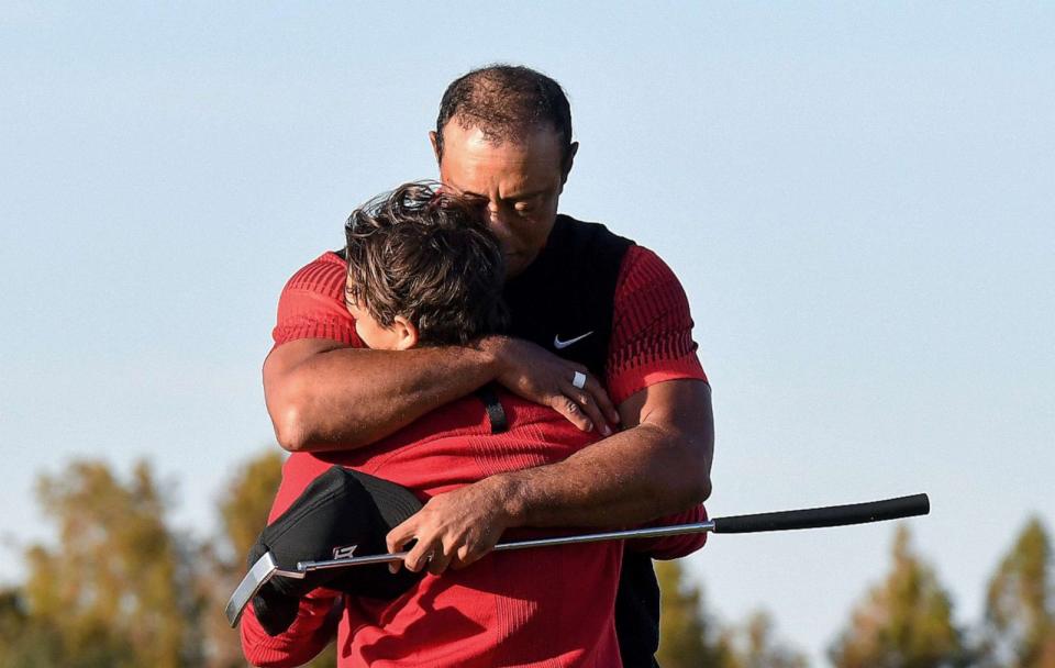 PHOTO: Tiger Woods embraces his son Charlie Woods, Dec. 18, 2022, on the 18th hole during the final round of the PNC Championship at the Ritz-Carlton Golf Club in Orlando, Fla,. (LightRocket via Getty Images, FILE)