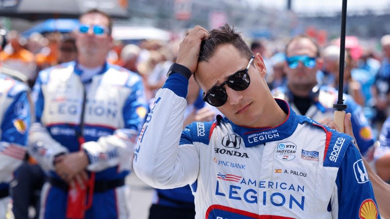  IndyCar Chip Ganassi Racing driver Álex Palou (10) of Spain stands before the singing of the American National Anthem during the 2023 Gallagher Grand Prix at Indianapolis Motor Speedway in Indianapolis.