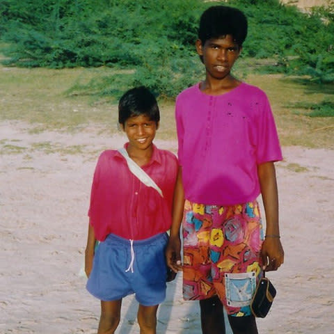 Venkat (left, with a pal, Seeni) in ‘ill-fitting blue shorts’ the day Sylvia met him