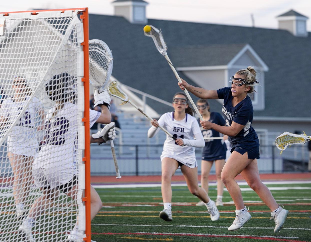 Manasquan’s Belle Porazzo shoots and scores in second half action. Manasquan Girls Lacrosse outlasts Rumson-Fair Haven 10-9 in Rumson on April 23, 2024.