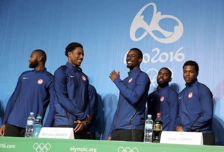 2016 Rio Olympics - Men's Basketball - News Conference - Rio De Janeiro, Brazil - 04/08/2016. DeMarcus Cousins (USA) of USA, Demar DeRozan (USA) of USA, Harrison Barnes (USA) of USA, Kyrie Irving (USA) of USA and Kyle Lowry (USA) of USA (L-R) stand during a news conference. REUTERS/Lucy Nicholson