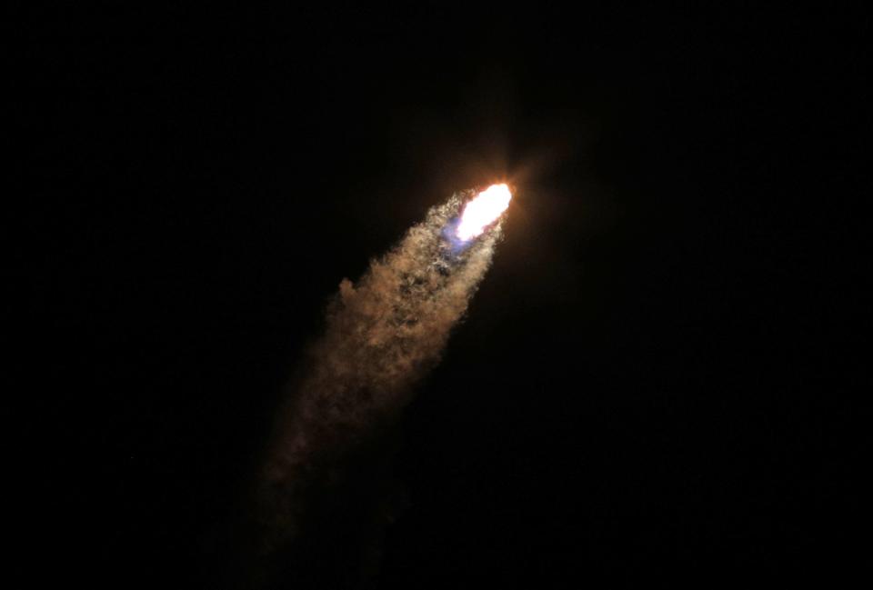 A SpaceX Falcon 9 rocket soars into orbit Thursday from the Kennedy Space Center in Florida. The IM-1 mission is part of NASA's Commercial Lunar Payload Services (CLPS) program to understand more about the Moon's surface ahead of the coming Artemis missions.