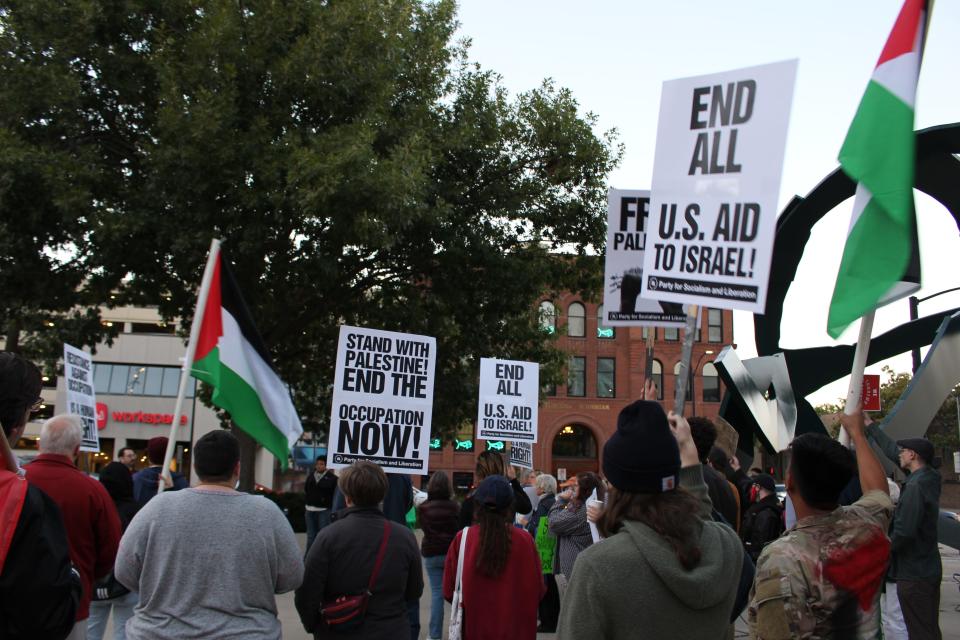 People gathered at Cowles Commons in downtown Des Moines to call for an end to U.S. aid to Israel and rally in support of the Palestinian people on Tuesday, Oct. 10, 2023.