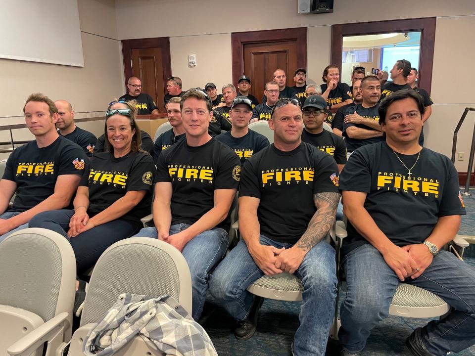 Firefighters attend a City Council meeting on May 9, 2022, in Pueblo, Colo.