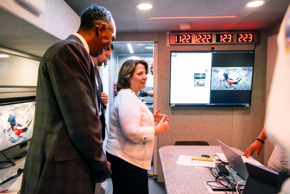 Deputy Attorney General Lisa Monaco and Alcohol, Tobacco and Firearms (ATF) acting director Marvin G. Richardson tour an ATF crime gun intelligence mobile command center, which provides investigators with ballistic processing at crime scenes, in Washington, on Thursday, July 22, 2021.