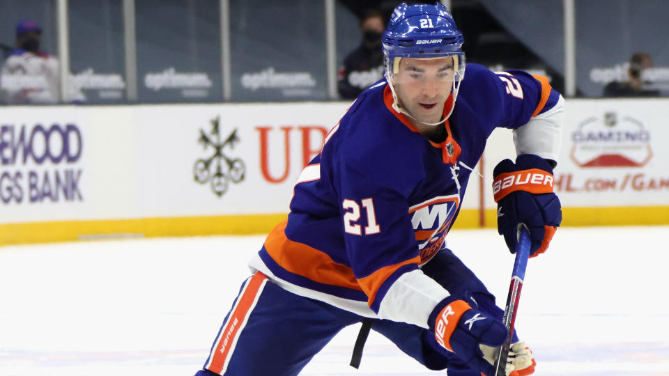 UNIONDALE, NEW YORK - APRIL 11: Kyle Palmieri #21 of the New York Islanders skates against the New York Rangers at the Nassau Coliseum on April 11, 2021 in Uniondale, New York. The Islanders defeated the Rangers 3-2 in overtime. (Photo by Bruce Bennett/Getty Images)