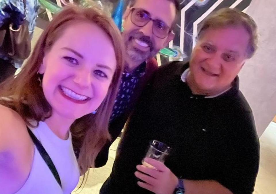 Albert “Bert” Franquiz (right) celebrating the Miami Herald’s 2022 Pulitzer Prize with colleagues Amy Reyes and Eddie Alvarez.