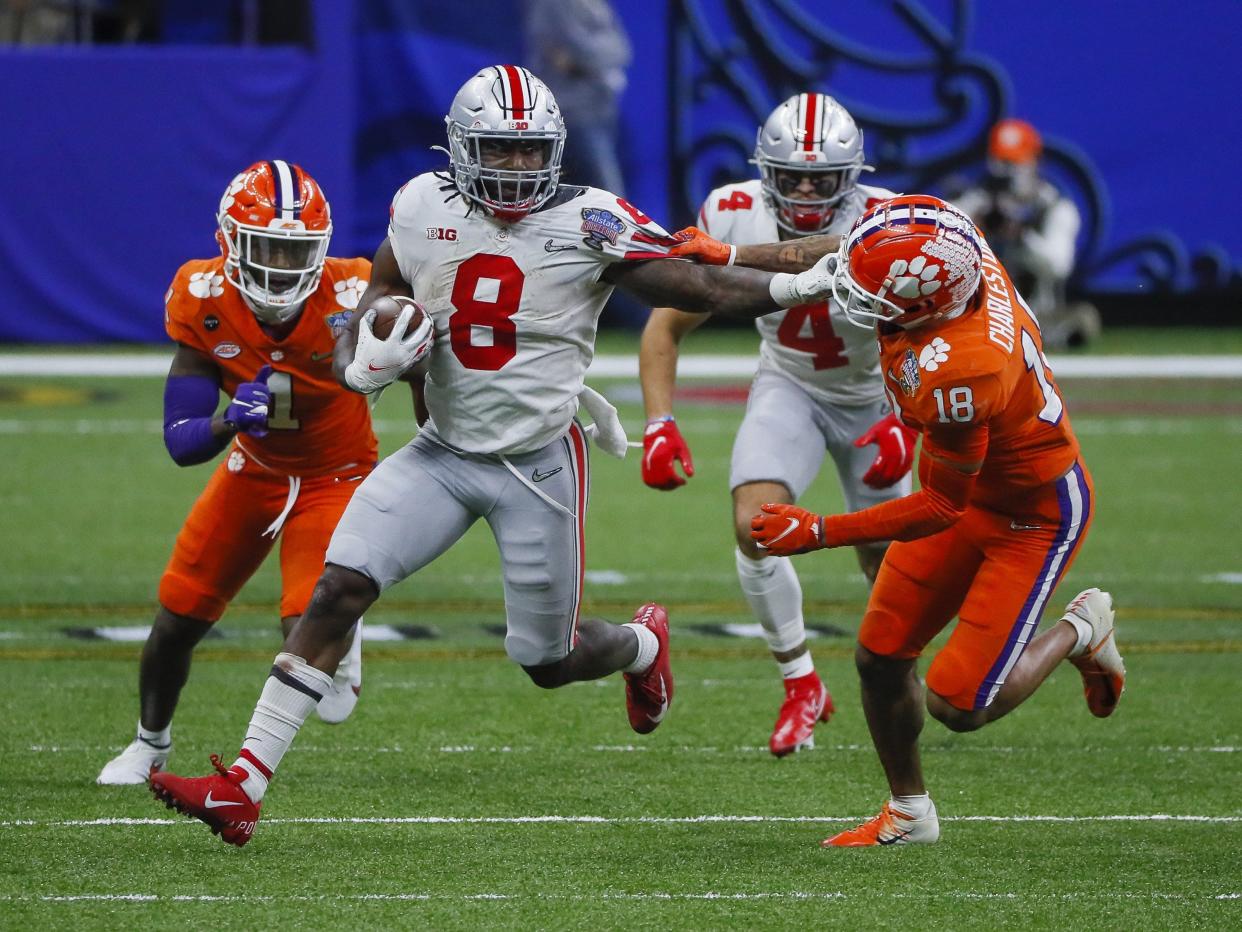 The Ohio State Buckeyes and Clemson Tigers battle during the College Football Playoff semifinal at the Allstate Sugar Bowl on Jan. 1, 2021.