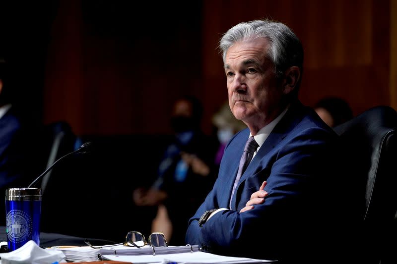 FILE PHOTO: Federal Reserve Chair Jerome Powell listens during a Senate Banking Committee hearing in Washington