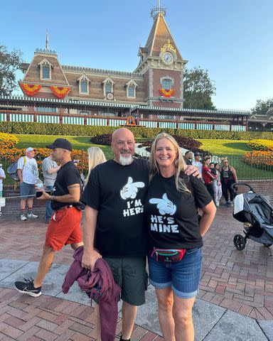 <p>Christine Brown Instagram</p> Christine Brown and David Woolley while on their honeymoon at Disneyland in 2023.