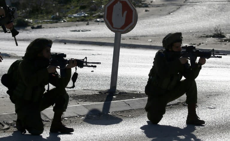 Israeli soldiers and Palestinian stone throwers clash east of Nablus, in the occupied West Bank