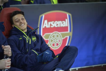 Britain Football Soccer - Arsenal v Bayern Munich - UEFA Champions League Round of 16 Second Leg - Emirates Stadium, London, England - 7/3/17 Arsenal's Mesut Ozil on the substitutes bench Reuters / Hannah McKay Livepic