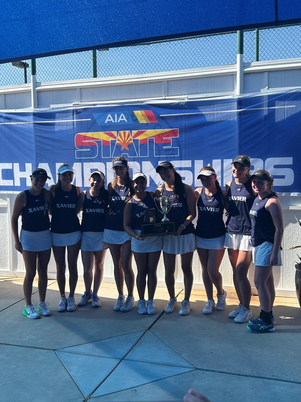 Xavier Prep celebrating title after dethroing Desert Mountain in Division I girls tennis.