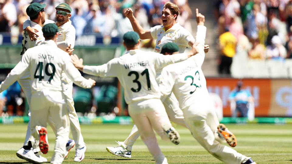 Cameron Green, pictured here celebrating with Aussie teammates after snaring the final wicket.