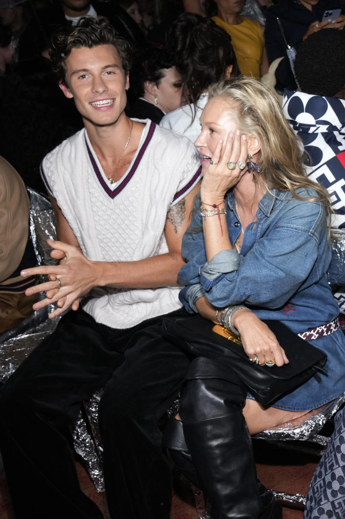 Shawn Mendes, left, and Kate Moss attend the Tommy Hilfiger Fall 2022 fashion show at the Skyline Drive-In on Sunday, Sept. 11, 2022, in New York. (Photo by Charles Sykes/Invision/AP)