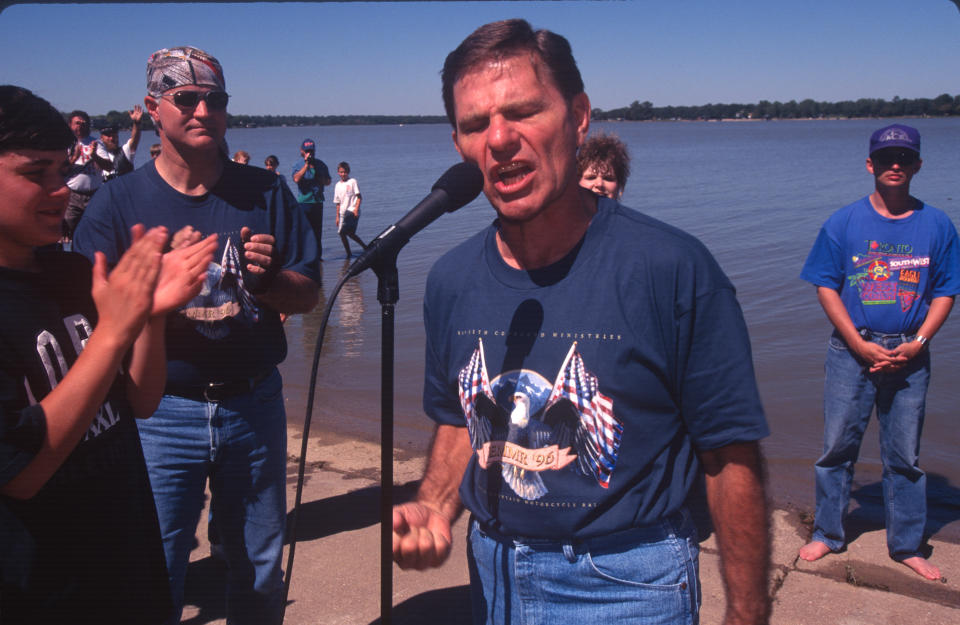 NEWARK, TEXAS - SEPTEMBER 28: Minister Kenneth Copeland prays at an annual evangelical motorcycle rally on his Eagle Mountain Lake property on September 28, 1996 in Newark, Texas. (Photo by Andrew Lichtenstein/Corbis via Getty Images)