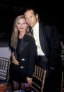 <p>The philanthropic pair poses at 5th Annual California Fashion Industry Friends of Aids Project Benefit honoring Gianni Versace in 1991.</p>