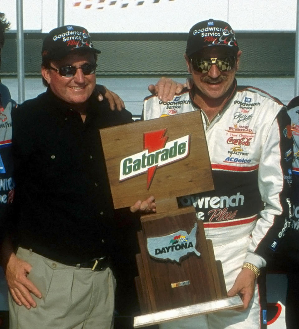 FILE - In this Feb. 1999, file photom NASCAR driver Dale Earnhardt, right, and team owner Richard Childress, pose in Victory Lane after Earnhardt won a qualifying auto race for the Daytona 500 at Daytona International Speedway in Daytona Beach, Fla. Childress, now 75, often wonders what NASCAR would look like had Earnhardt survived. Childress was far more than Earnhardt's car owner. The two were hunting and fishing buddies, business associates and close friends. (AP Photo/Harold Hinson, File)