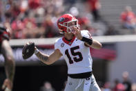 Georgia quarterback Carson Beck (15) throws a pass during the first of an NCAA college spring football game Saturday, April 13, 2024, in Athens, Ga. (AP Photo/John Bazemore)