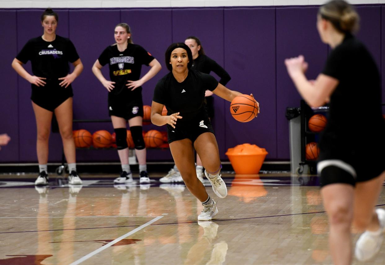 Sophomore forward Simone Foreman moves upourt during a recent Holy Cross women's basketball practice.