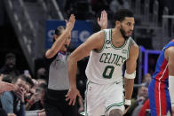 Referee Ashley Moyer-Gleich signals a three-point basket by Boston Celtics forward Jayson Tatum (0) during the second half of an NBA basketball game against the Detroit Pistons, Monday, Feb. 6, 2023, in Detroit. (AP Photo/Carlos Osorio)
