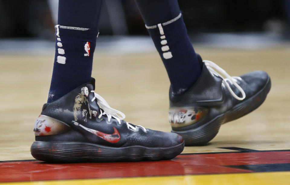 Karl-Anthony Towns wore “Friday the 13th”-inspired sneakers, complete with Jason Voorhees wielding a Swoosh. (AP)