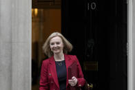 FILE - Liz Truss, Britain's Foreign Secretary, leaves 10 Downing Street after a Cabinet meeting held ahead of the Budget being delivered by the Chancellor of the Exchequer Rishi Sunak in London, Oct. 27, 2021. Revelations that Prime Minister Boris Johnson and his staff partied while Britain was in a coronavirus lockdown have provoked public outrage and led some members of his Conservative Party to consider ousting their leader. If they manage to push Johnson out — or if he resigns — the party would hold a leadership contest to choose his replacement. Truss, 46, took on the high-profile job of foreign secretary in September after serving as trade minister and has been gaining momentum as a contender since. (AP Photo/Alastair Grant, File)