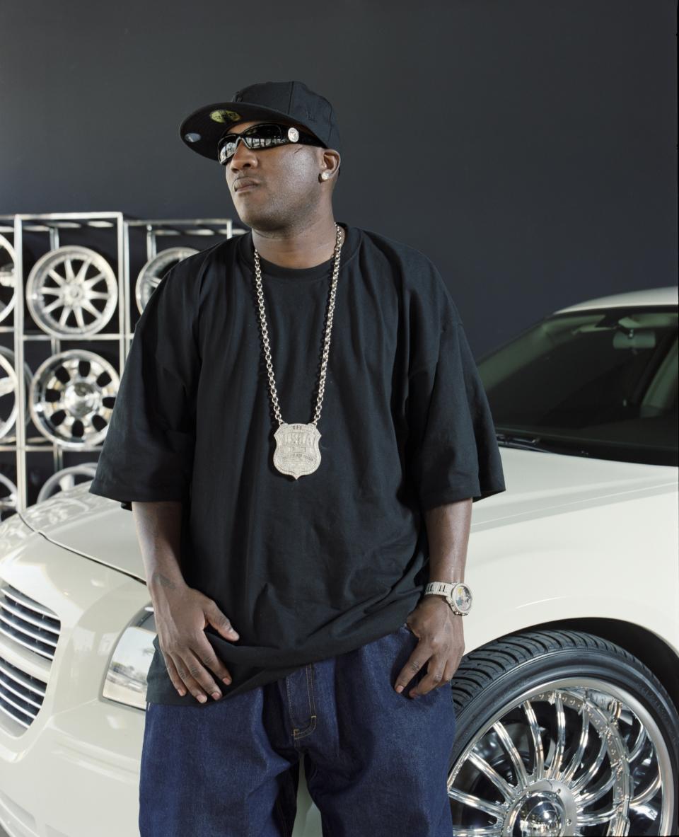 Young Jeezy poses next to a car for a photo session in 2005.