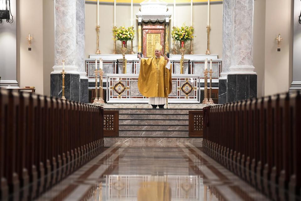 Bishop Richard Stika celebrates Easter Mass in 2020 at the Cathedral of the Most Sacred Heart of Jesus in Knoxville. Pews were empty because of coronavirus restrictions.