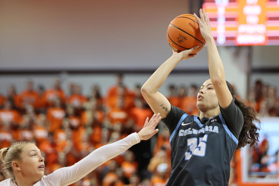 BOWLING GREEN, OH - MARCH 29: Abbey Hsu #35 of the Columbia Lions shoots the ball against Lexi Fleming #25 of the Bowling Green Falcons during the first quarter of a Fab 4 Round game of the Women's NIT tournament at Stroh Center at Stroh Center on March 29, 2023 in Bowling Green, Ohio. (Photo by Isaiah Vazquez/Getty Images)