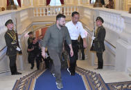 In this photo released by Indonesian Presidential Palace, Indonesian President Joko Widodo, right, walks with his Ukrainian counterpart Volodymyr Zelensky during their meeting in Kyiv, Ukraine on Wednesday, June 29, 2022. Widodo, whose country holds the rotating presidency of the Group of 20 leading rich and developing nations, is currently on a tour to Ukraine and Russia for meetings with the leaders of the two warring nations following a visit to Germany to attend the Group of Seven summit. (Agus Suparto, Indonesian Presidential Palace via AP)