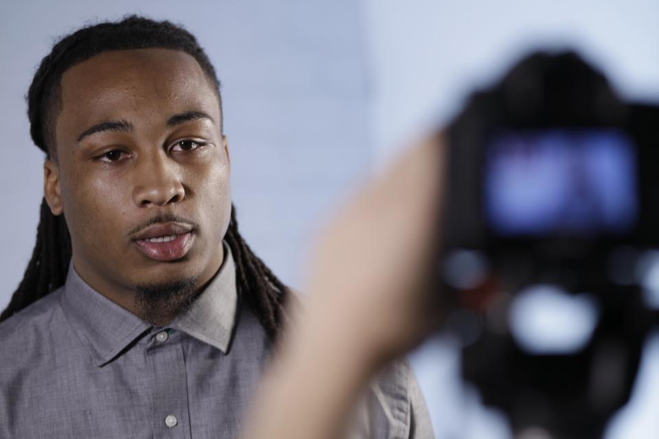 This May 6, 2014 photo shows NFL Draft prospect Calvin Pryor, a safety from Louisville, responding to questions during an interview at the 5th Annual NFL Pre-Draft Gifting & Style Suite at the Sean John show room in New York. Pryor is among dozens of prospects on the National Football League's annual draft, with 32 players per round and seven rounds, beginning Thursday night at Radio City. (AP Photo/Frank Franklin II)