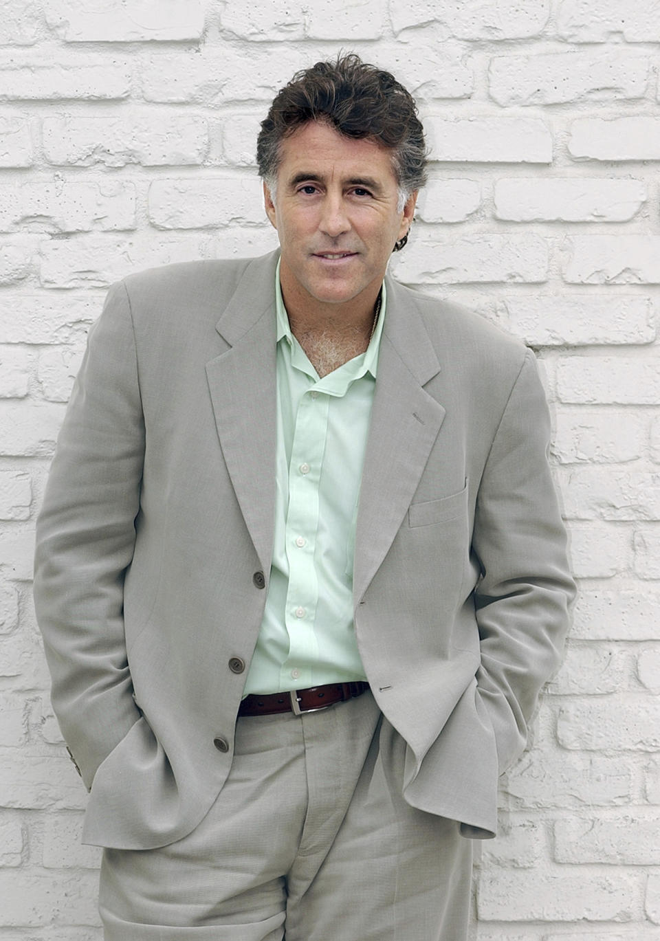 FILE - In this Sept. 16, 2005 file photo, Christopher Kennedy Lawford poses for a photograph in Encino, Calif., to promote his book, "Symptoms of Withdrawal: A Memoir of Snapshots and Redemption." Patrick Kennedy says Lawford died of a heart attack on Tuesday, Sept. 4, 2018, in Vancouver. He was 63. (AP Photo/Rene Macura, File)