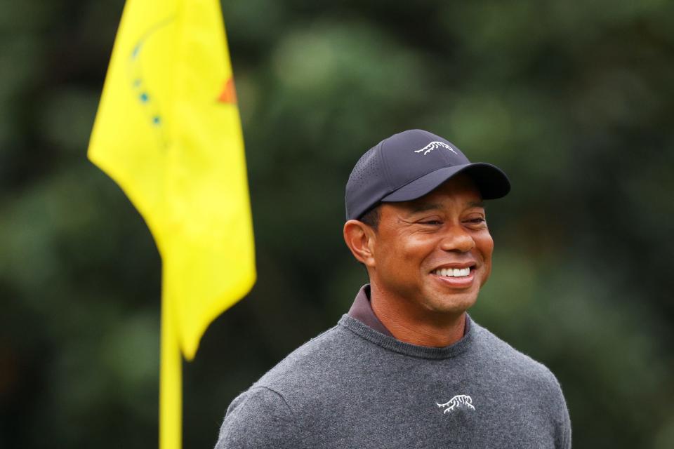 Tiger Woods smiles during a practice round prior to the 2024 Masters Tournament at Augusta National Golf Club on April 09, 2024 in Augusta, Georgia.