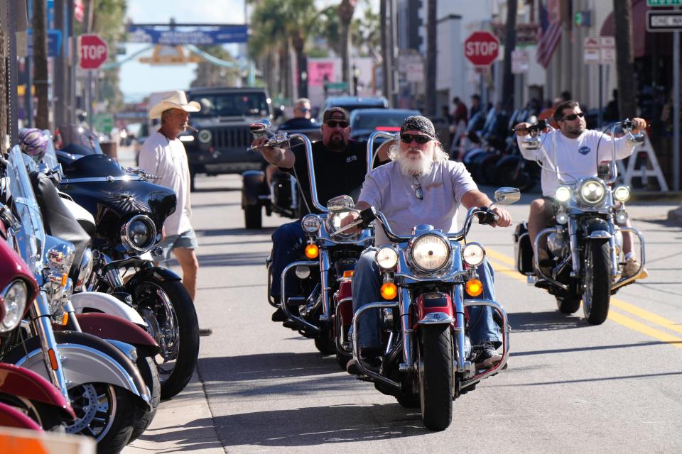 Bikers roll along Main Street under cloudless sunny skies on the opening day of Biketoberfest in Daytona Beach. The 2023 edition of the event runs through Sunday in Daytona Beach and throughout Volusia and Flagler counties.