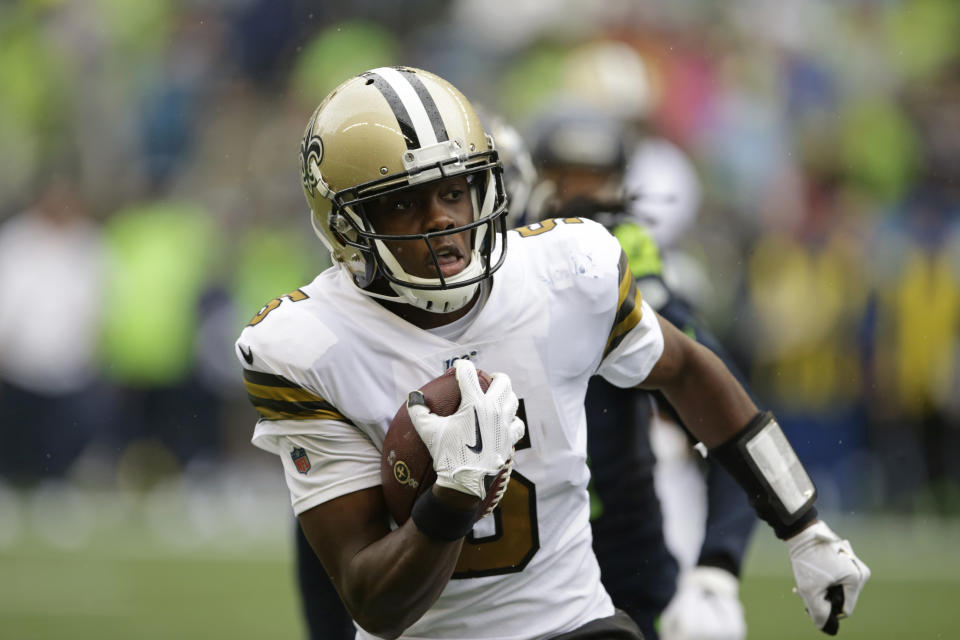 New Orleans Saints quarterback Teddy Bridgewater carries the ball against the Seattle Seahawks during the second half of an NFL football game Sunday, Sept. 22, 2019, in Seattle. (AP Photo/Scott Eklund)