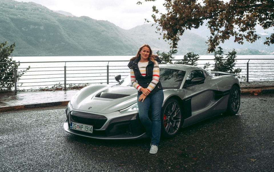 'I like it. I really like it': Vicky Parrott pictured with the Rimac Nevera
