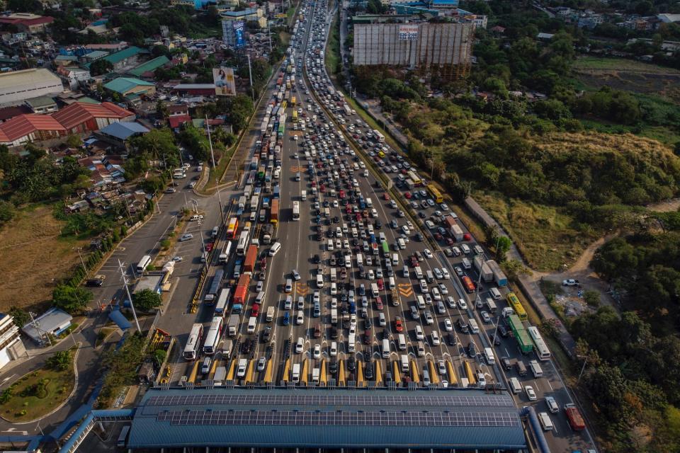 An aerial view of traffic at North Luzon Expressway hours before Manila is placed on lockdown, on March 14 in the outskirts of Metro Manila, Philippines.