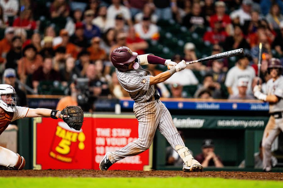 Texas State’s Aaron Lugo blows a bubble as he hits a 2-run home run into the Crawford Boxes at Minute Maid Park in Houston in the Bobcats 11-10 win over No. 15 Texas on Saturday during the Astros Foundation College Classic. (Photo courtesy of Texas State Athletics)