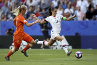 United States' Alex Morgan, right, fights for the ball with Netherlands' Stefanie Van Der Gragt during the Women's World Cup final soccer match between US and The Netherlands at the Stade de Lyon in Decines, outside Lyon, France, Sunday, July 7, 2019. (AP Photo/David Vincent)