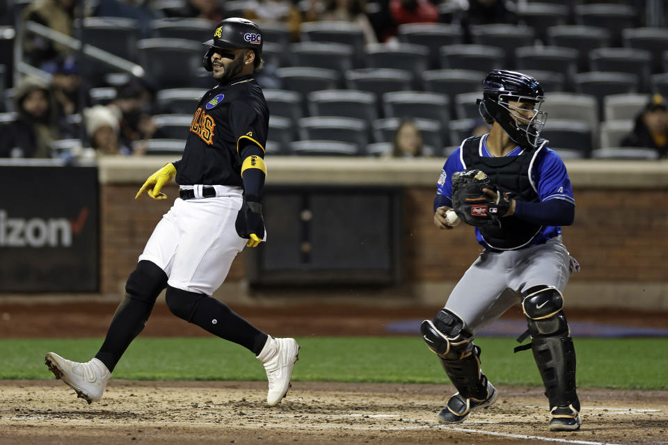 Los Tigres del Licey's Francisco Mejia gets the force at home on Águilas Cibaeñas' Jonathan Villar during the third inning of a Dominican Winter League baseball game Friday, Nov. 10, 2023, in New York. (AP Photo/Adam Hunger)